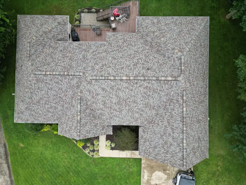 Top-down drone view of a gray asphalt shingle roof — Palisade Roofing, East Tennessee.